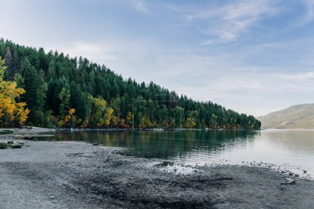 Whitefish Lake shoreline in autumn with beautiful fall foliage