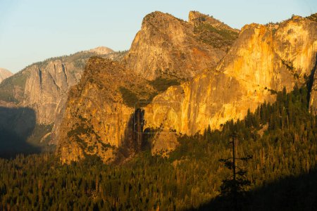 Yosemite Valley at sunlight falling on three brothers.