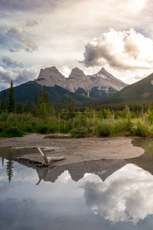 Three Sisters in moody weather in Canmore, Alberta, Canada.