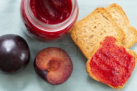 Photo for Hearty Breakfast of Toasted Bread and Homemade Plum Jam - Royalty Free Image