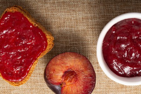 Photo for Hearty Breakfast of Toasted Bread and Homemade Plum Jam - Royalty Free Image