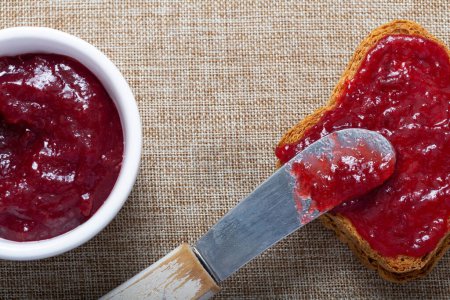 Photo for Sumptuous Plum Preserves on Crispy Toast - Royalty Free Image