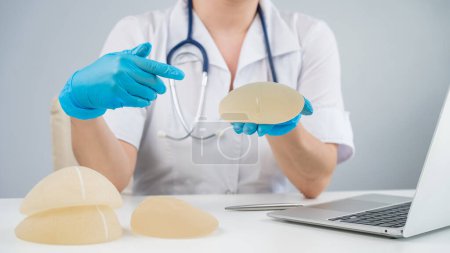 Doctor plastic surgeon explains the benefits of different breast implants