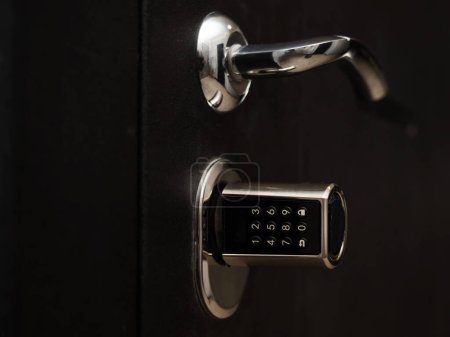 Photo for Door to the apartment with a combination lock. Keyless entry - Royalty Free Image
