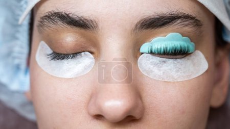 Caucasian woman on eyelash lamination procedure. Before and after