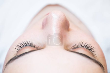 Photo for Close-up of a caucasian woman after eyelash lamination procedure - Royalty Free Image