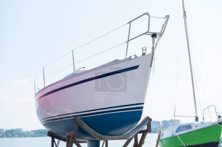 Photo for Small yacht parked in the yacht club - Royalty Free Image