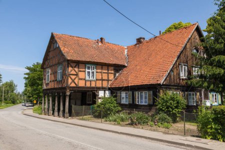 Photo for Zulawki, Zulawy, Poland - 15 June 2019: Traditional buildings of peasant architecture in Zulawy Wislane. Spring season. Sunny day. - Royalty Free Image