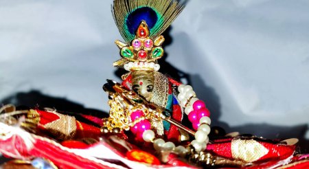 Photo for Lord Krishna also known as laddu gopal sculpture in beautiful clothes selective focus - Royalty Free Image