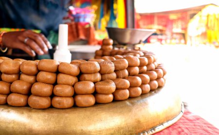 Photo for Indian Sweet shop display peda or pera outside of temple at lucknow - Royalty Free Image