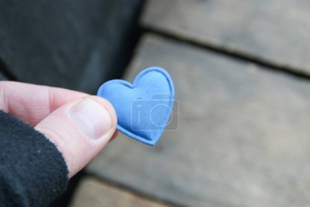 Photo for Hand holding heart. Valentine's Day concept. Birthday background. - Royalty Free Image