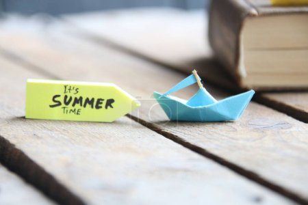 Photo for Its Summer Time concept. Origami paper boat and text. - Royalty Free Image