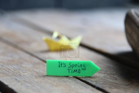 Photo for Origami paper boat and tag Its spring time. - Royalty Free Image