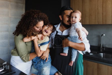 Téléchargez les photos : Hispanic family with children daughter and son at home in Mexico Latin America - en image libre de droit
