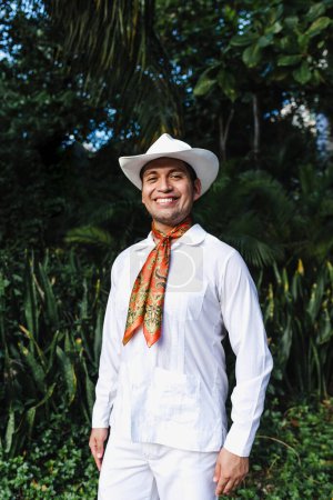 Latin man wearing traditional Mexican custom called "jarocho" traditional from Veracruz Mexico Latin America, young hispanic people in cultural Festival