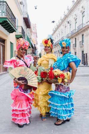 Cuban woman called canasteras with habano flowers and typical costume in La Havana, Afro caribbean people in Latin America
