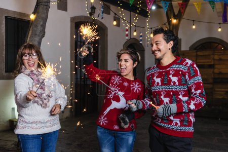 Mexican Posada, hispanic family Singing carols in Christmas celebration in Mexico Latin America culture and traditions