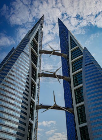 Photo for The Bahrain World Trade Center is an iconic architectural landmark in Manama, featuring a unique design with wind turbines integrated into its structure. - Royalty Free Image