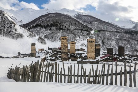 A view of the snowy Svan towers in the Georgian village of Ushguli, Svaneti
