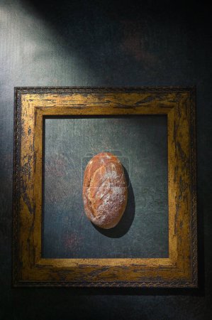 Photo for Homemade Sourdough Rye Bread Top View Inside of Classic Frame - Royalty Free Image