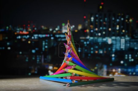 Photo for Abstract Christmas Tree from Pencils and City Lights Background - Royalty Free Image