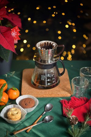 Photo for Closeup Barista Coffee Drip Maker on Holidays Table - Royalty Free Image