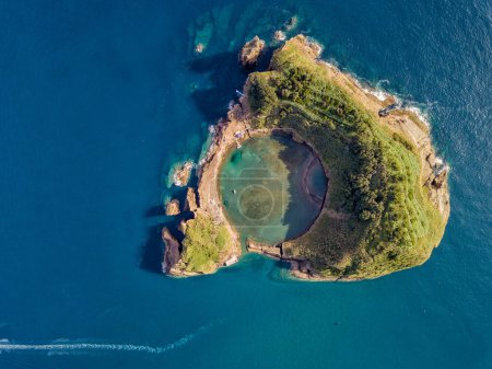 Photo for Azores aerial panoramic view. Top view of Islet of Vila Franca do Campo. Crater of an old underwater volcano. San Miguel island, Azores, Portugal. Heart carved by nature. Bird eye view. - Royalty Free Image
