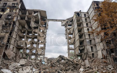 Photo for Destroyed and burned houses in the city Russia Ukraine war - Royalty Free Image