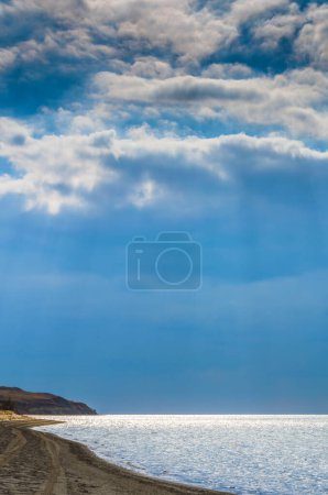 Photo for Vertical seascape with blue sky and clouds - Royalty Free Image