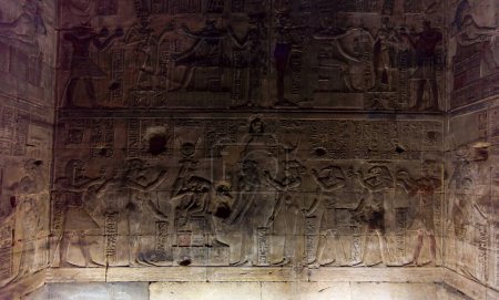 Photo for Hieroglyphs on the wall of an ancient building in Egypt in the dark - Royalty Free Image