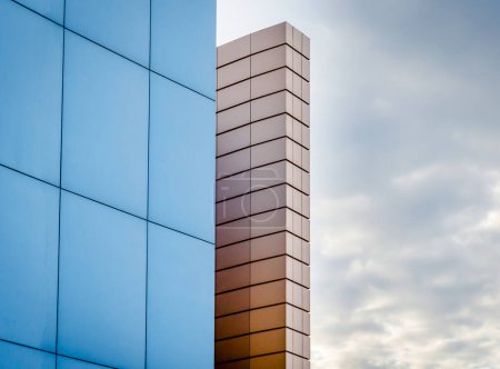 Photo for Fragment of the building wall against the background of the autumn sky - Royalty Free Image