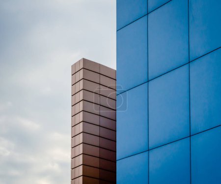 Photo for Fragment of the building wall against the background of the autumn sky - Royalty Free Image