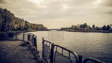 view of the river and the forest from the embankment Chernobyl Ukraine
