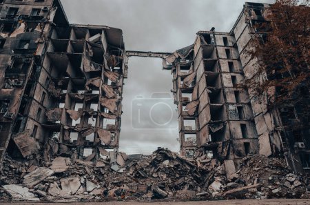 Photo for Destroyed and burned houses in the city Russia Ukraine war - Royalty Free Image