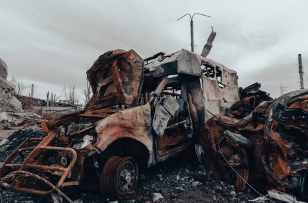 burnt cars and destroyed buildings of the workshop of the Azovstal plant in Mariupol war in Ukraine with Russia