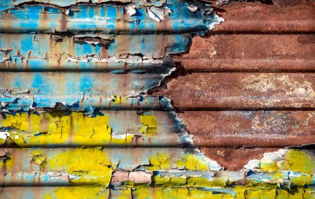 pattern rusty metal surface with remnants of blue and yellow paint paint national colors flag of ukraine