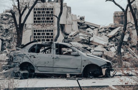 damaged and looted cars in a city in Ukraine during the war with Russia