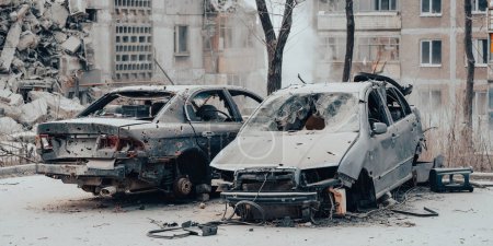 Photo for Damaged and looted cars in a city in Ukraine during the war with Russia - Royalty Free Image