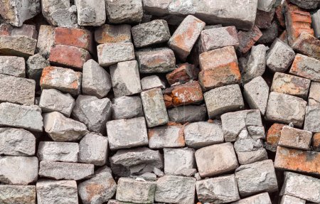 Téléchargez les photos : Pile chaotique de vieille brique de pierre motif de fond abstrait gros plan - en image libre de droit