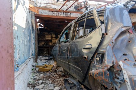 The text in Russian is the word "children" on a broken damaged car war in Ukraine