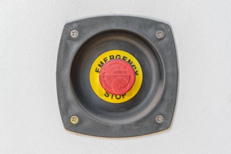 red and yellow emergency stop button of the electric unit
