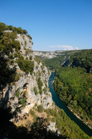 Photo for Limestone cliff and Ardeche River Gorge Provence, France. View from the observation deck of Grotte de la Madeleine, Saint Remeze. - Royalty Free Image