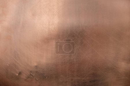 Photo for Copper background. Copper sheet. Left natural lighting. There are scratches on the copper surface. - Royalty Free Image