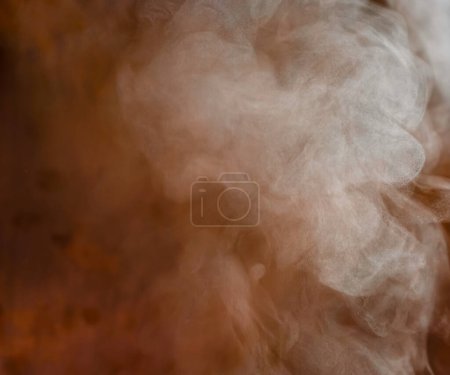 Photo for The movement of steam. Copper background. Blur. Abstract. Copy space. - Royalty Free Image