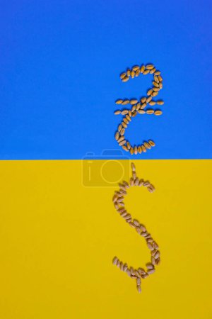 Ukrainian currency symbol (Ukrainian hryvnia). American dollar symbol. Wheat grain. Ukraine Flag. Grain deals and world trade.