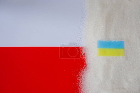 Zucker. Polen-Fahne. Ukraine-Flagge. Import oder Export. Lebensmittelstreit. Kopierraum.