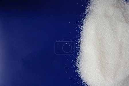 Sugar. Blue Background of European Union Flag. Import or Export. Copy Space.