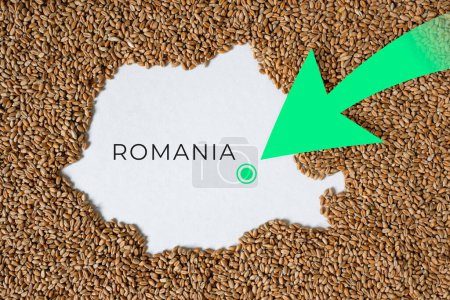 Map of Romania filled with wheat grain. Direction green arrow. Copy space.