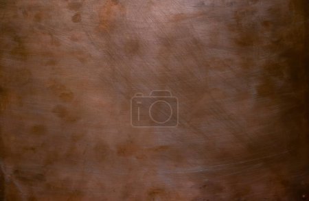 Copper sheet. Background. A flat piece of copper metal.