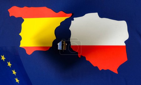 Photo for Spain map. Poland map. Euro Union flag. House model. Internal migration in the European Union. - Royalty Free Image